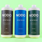 3 bouteilles montrant les différents arômes de NODO neutralisant d'odeurs pour eaux noires